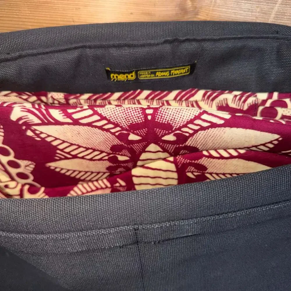 Mend Black Canvas Messenger Bag with Red Printed Interior Lining